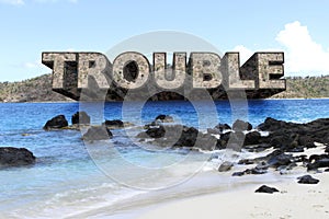 TROUBLE in PARADISE - Large Text Protrudes from Island