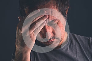 Troubled man thinking about problems