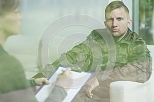 Troubled soldier during psychotherapy session