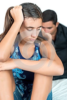 Troubled teenage girl with her worried father photo