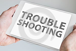 Troubleshooting text displayed on touchscreen of modern tablet or smart device.