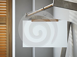 Trouser hanger with white paper sheet. 3d rendering