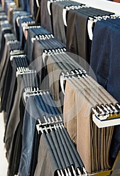 Trousers on hangers for sale