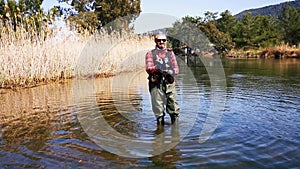 Trout hunt between reedy. In Hisaronu.