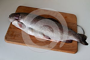 Trout lying on a cutting board