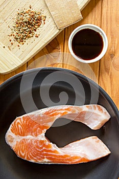 Trout in the pan with the sauce and spices