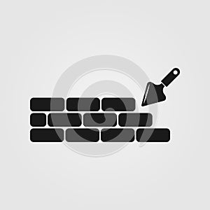 Trowel and brick wall icon. Building house, construction concept icon