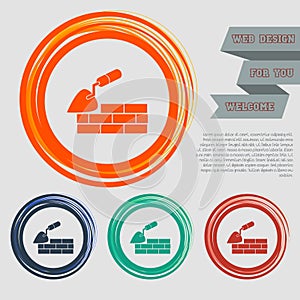 Trowel building and brick wall icon on the red, blue, green, orange buttons for your website and design with space text.