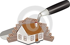 Trowel shovel with over a dwelling house photo
