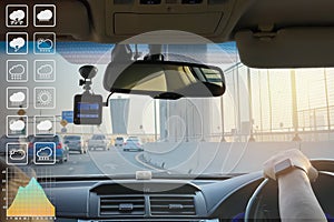 Trsnaportation and travel business with interior inside vehicle and steering wheel control by driver on expressway urban view