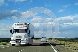 Truck and car on the road