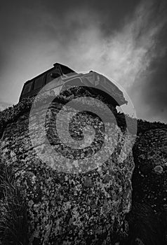 Truck car wheel on offroad steppe adventure trail. SUV race on dirt. Low angle view of front of SUV on mountain road.