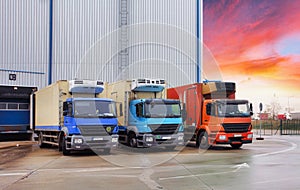 Truck cargo with lift parking at warehouse, road freight delivery logistics and transport