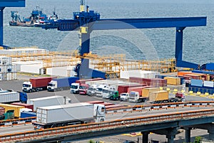 Truck carries container to warehouse sea