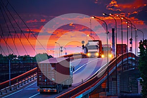 Truck with container rides on the road, railroad transportation, freight cars in industrial seaport at sunset