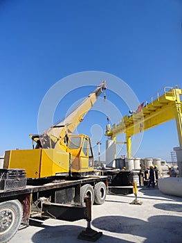 Truck crane and yellow structure