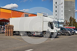 Truck delivering goods to shops