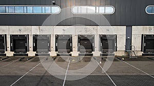 Truck dock platform logistics warehouse empty space door for loading and unloading goods moving sideways