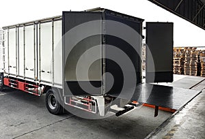 Truck docking load cargo shipment goods at warehouse