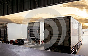 Truck docking load cargo shipment goods at warehouse