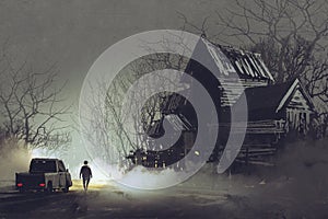 Truck driver and abandoned haunted old house photo