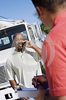 Truck Driver With His Coworker photo