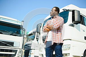 Truck Driver man African American muscular smiling, in long-time business transportation and delivery