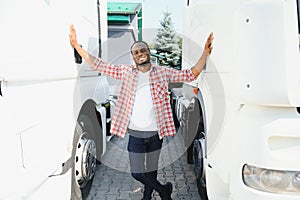 Truck Driver man African American muscular smiling, in long-time business transportation and delivery