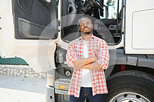 Truck Driver man African American muscular smiling, in long-time business transportation and delivery
