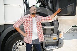 Truck Driver man African American muscular smiling, in long-time business transportation and delivery