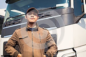 Truck Driver Standing with Semi Trucks. Freight Truck Transport Logistics