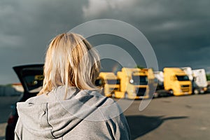 Truck driver woman on truck vehicles parking