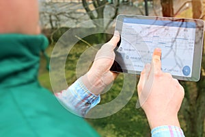 Truck driver writing electronic log books.