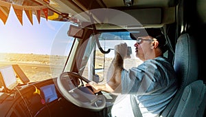 Truck drivers big truck right traffic hands holding radio and steering wheel