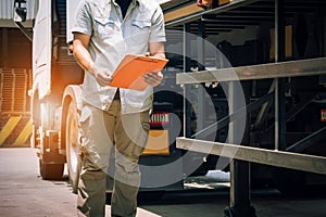 Truck Drivers Checking the Truck's Safety. Auto Mechanic. Truck Inspection Safety Driving.