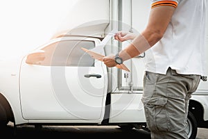 Truck Drivers Holding A Clipboard Checking The Truck Van. Maintenance Checklist. Freight Truck Transport.