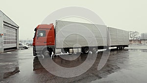 Truck drives through logistics center