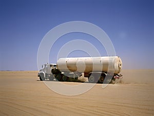 Truck driving through the Arab desert