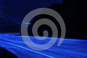 Truck Driving at Night on Curvy Hill