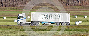 Truck driving through a rural area - Cargo