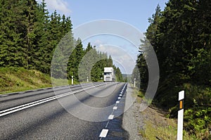 Truck driving a scenic country route