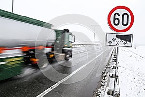 Truck driving on snowy road