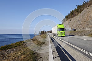 Truck driving on wide highway