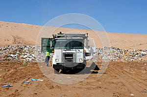 Truck dumping trash