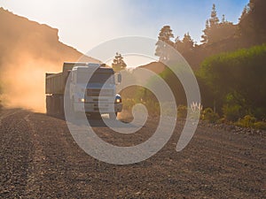 Truck in dust road