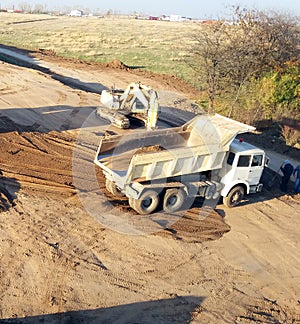 Truck and excavator