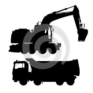 Truck and excavator.Detailed silhouettes of construction machines on white background