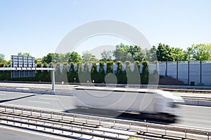 Truck in front of a modern noise protection wall