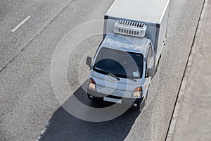 Truck goes on a city street