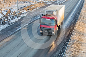 truck goes on winter snow highway